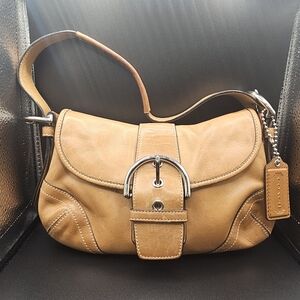 Vintage Coach Soho Flap leather shoulder bag in a British Tan color.